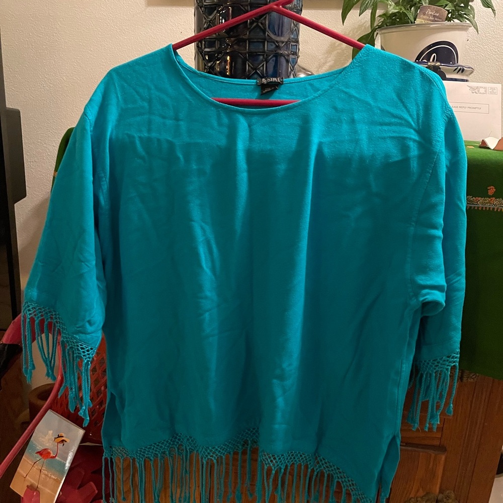 Dairi Fashion fringe top.             A